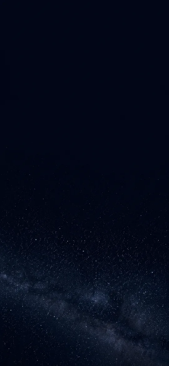 濃紺の夜空の壁紙。星は画面の下半分に集まり、いちばん下に天の川のような淡い帯がある